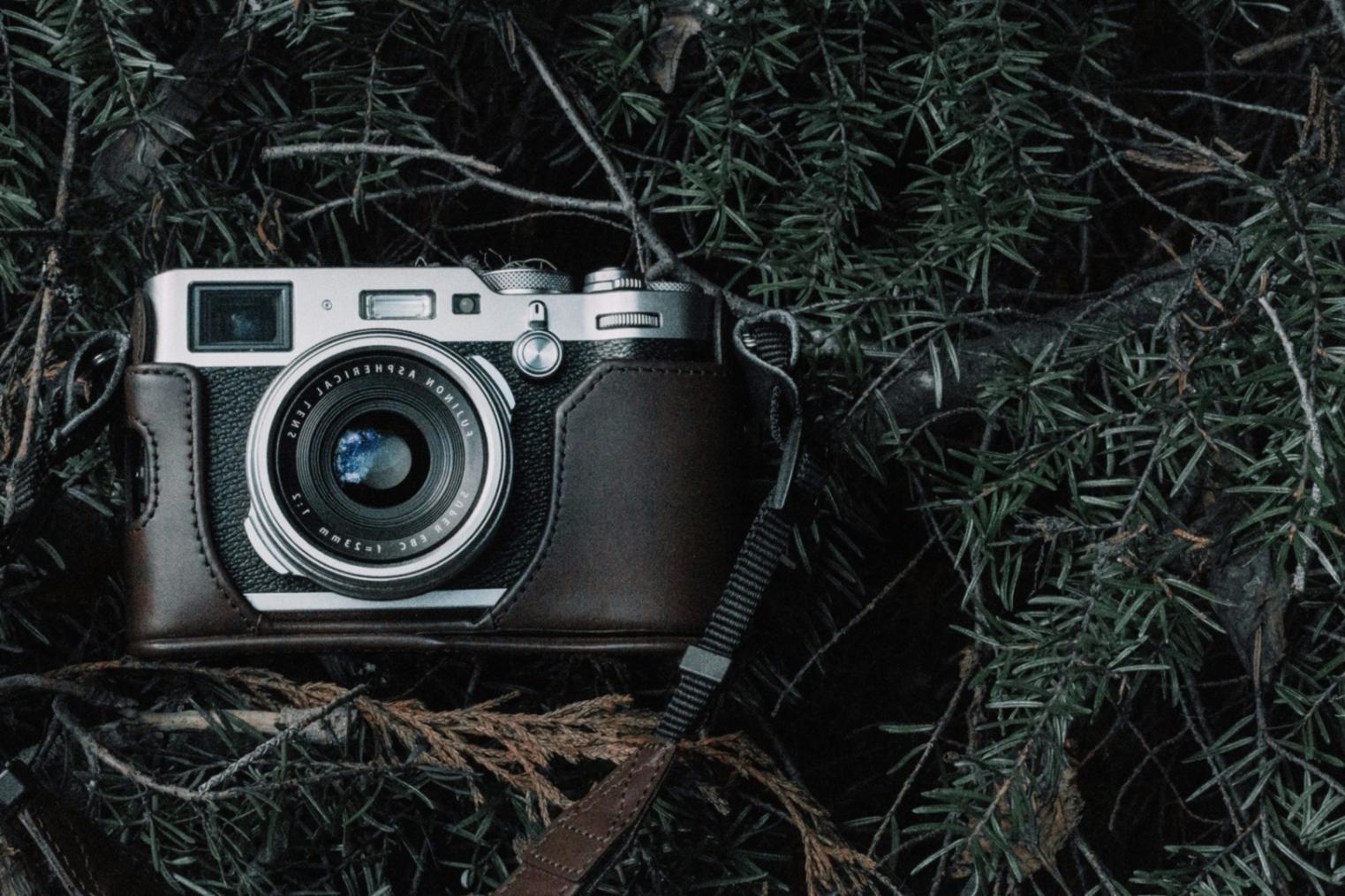 Professional video editing workspace with multiple monitors displaying timeline sequences