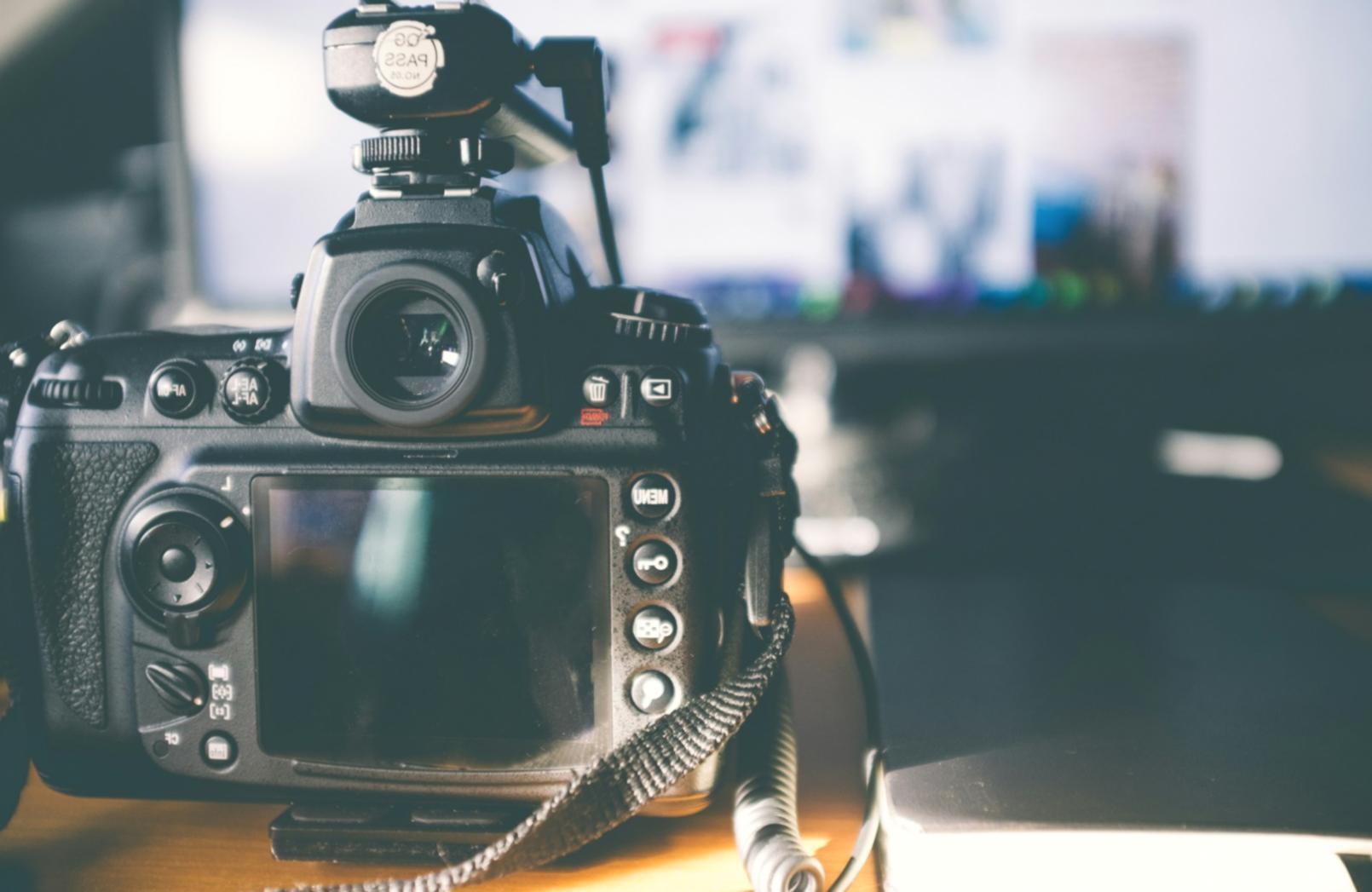 Editor reviewing footage with notes on pacing and story structure